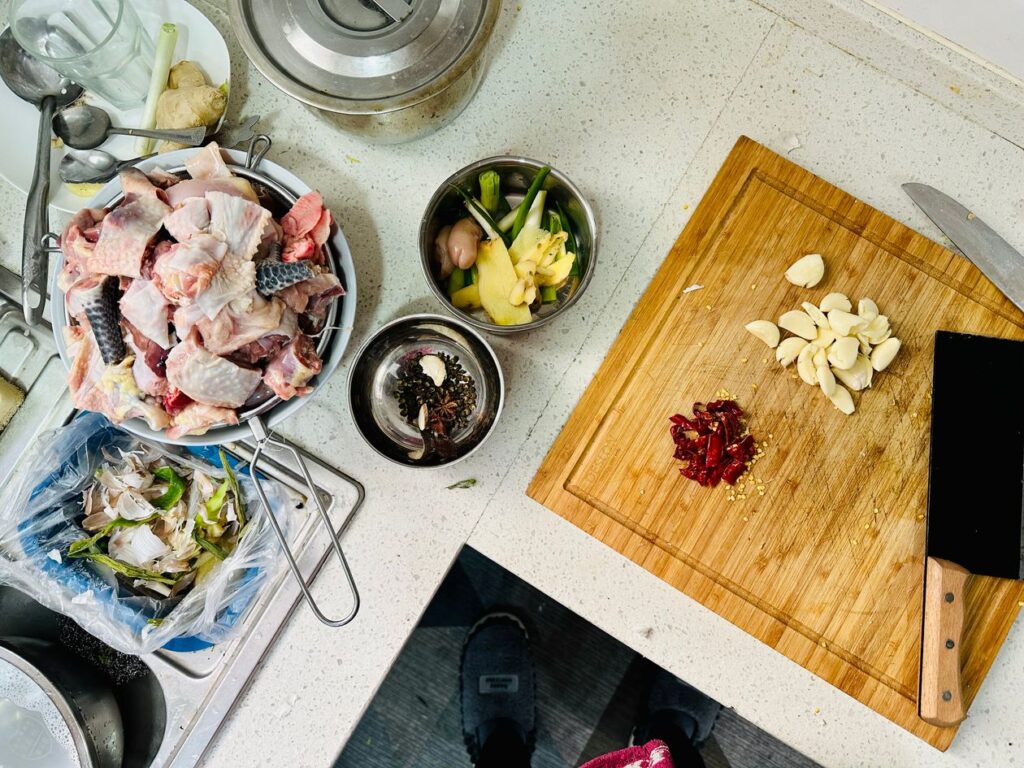 Fresh vegetables and ingredients laid out for a healthy meal